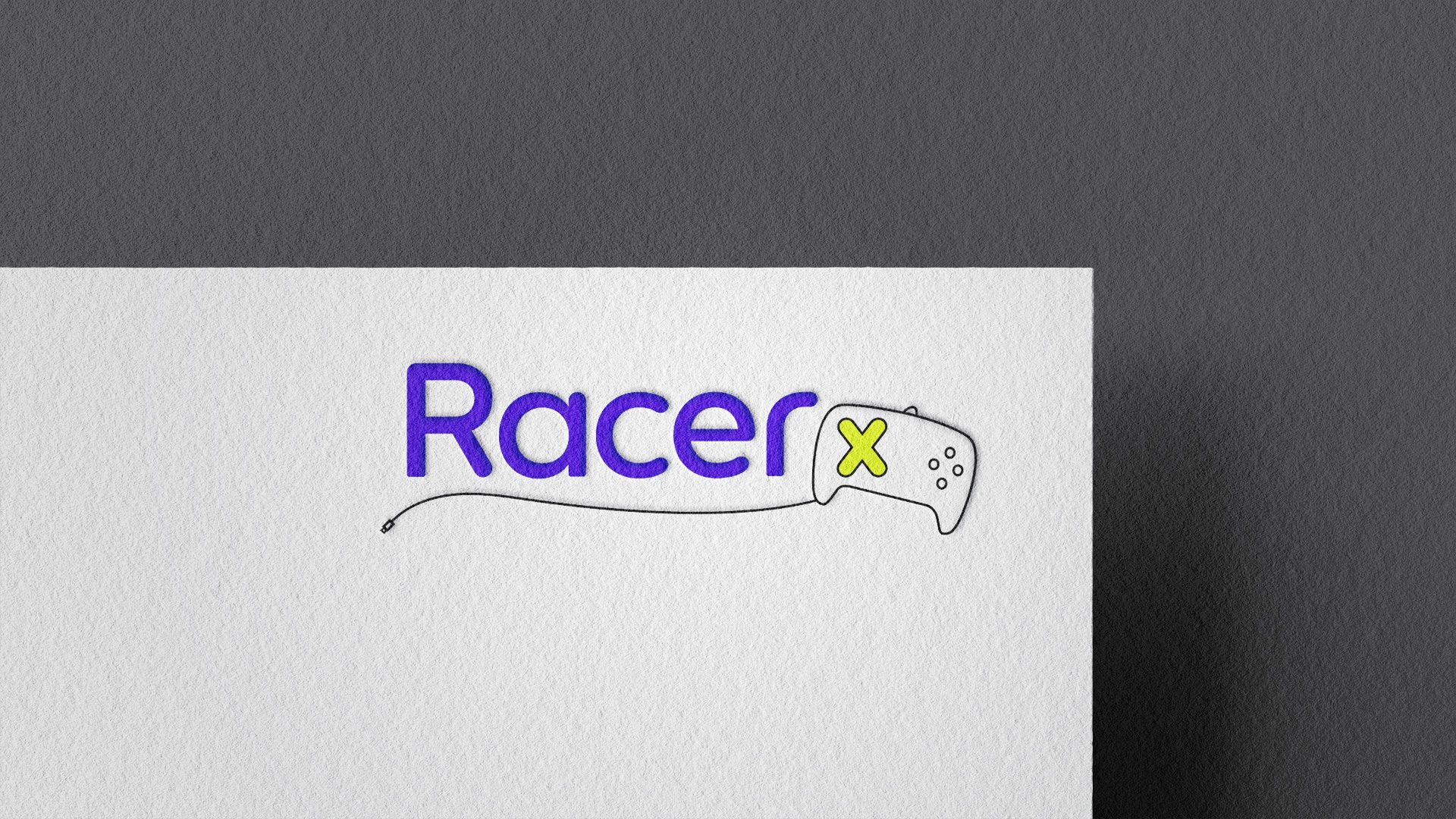 RacerX logo in neon purple next to a controller with a neon green X underlined by the video game controller wire. The logo is on a white paper with a gray background.