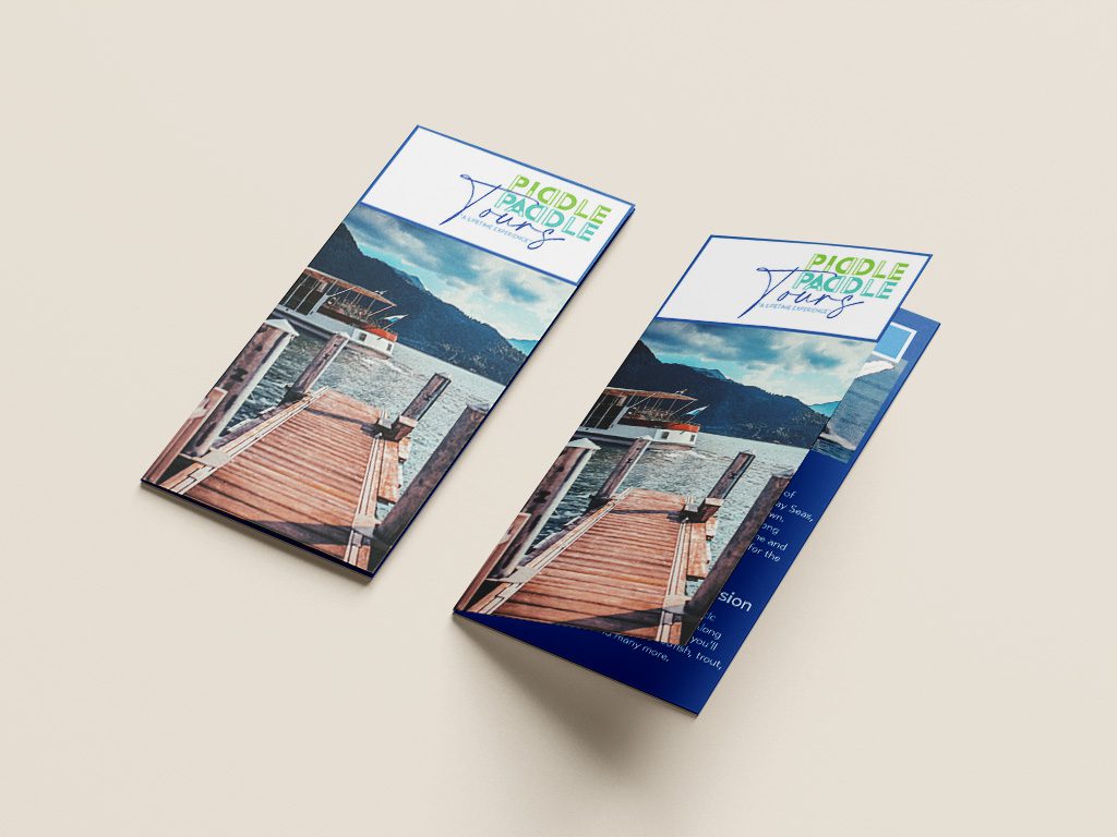 Piddle paddle tours front cover featuring the official logo and a dock image leading to the tour boat.